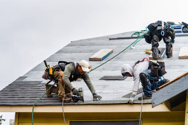 Professional Gutter Installation technician working in Royalston, MA